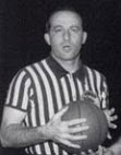 Referee Norm Drucker